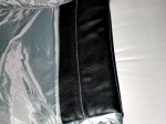 backside of the SafeFit Back Seat Storage with Seat Protector back