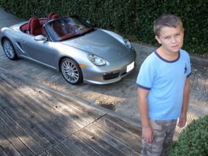 Mason w/ Porsche (Photo: Malcolm Parry, Vancouver Sun)