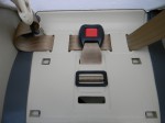 Crotch strap shortened by doubling back into middle slot